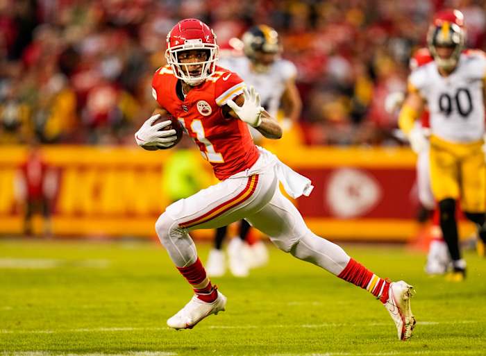 Kansas City Chiefs WR Demarcus Robinson runs after catch
